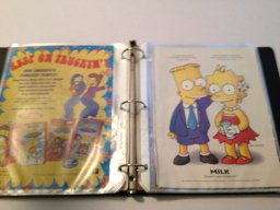 Custom Black Binder - Approx 50 pages of clippings